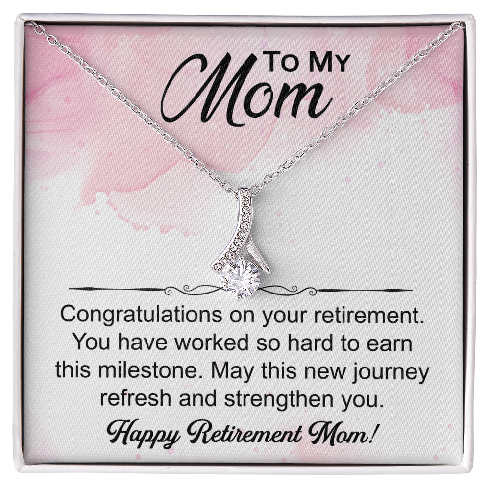 Love Knot necklace in a box with a heartfelt "Mom's Retirement" message, symbolizing love, gratitude, and new beginnings