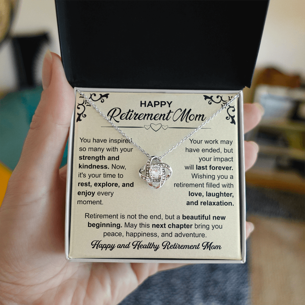 Love Knot necklace in a box with a heartfelt "Mom's Retirement" message, symbolizing love, gratitude, and new beginnings
