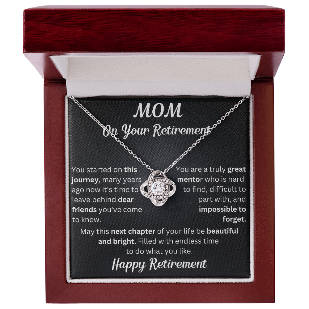 Love Knot necklace in a box with a heartfelt "Mom's Retirement" message, symbolizing love, gratitude, and new beginnings
