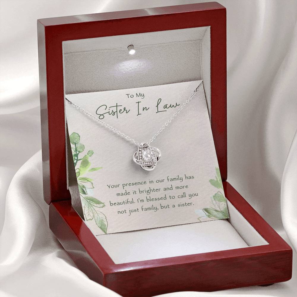 Sister-in-Law Gift, Celebrate your bond with the elegant Love Knot Necklace, featuring CZ crystals and a white gold or yellow gold finish. Perfect for birthdays, weddings, or Christmas.